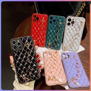 Cell Phone Cases is suitable for 13 small diamond-studded clover 12 electroplating hanging chain mobile phone case xr