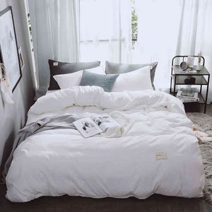 Conjunto de roupas de cama nórdicas Tampa de edredão de luxo com folha plana de 4 peças de cor sólida tampas brancas