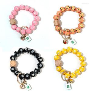 Keychains Design Small Daisy Wood Bead Armband Mahjong Bells Pendant Key Ring Bangle Fresh Wristlet Hand Charm smycken Emel22