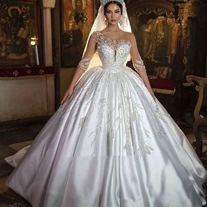 Wholesale arab bridal gowns resale online - Three Quarter Sleeve Dubai Arab princess Wedding Dress Illusion Crystal Appliques cathedral train Saudi Arabic Bridal Gown