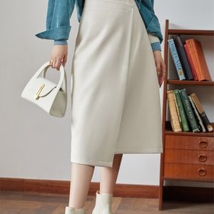 DUSHU PU Leather Irregular Design Winter High-waist Long Small A-line Skirts British Style Casual Short 220401