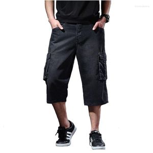 Shorts jeans de carga masculina de Mcikkny com bolsos múltiplos jeans curtos casuais soltos para masculino grande e alto