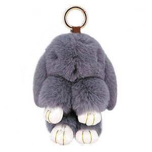 Coelho bonito pompom pelúcia chaveiro chaveiro artificial pele falsa 18cm saco artesanal moda jóias presente de carro brinquedos crianças feminina aa220318