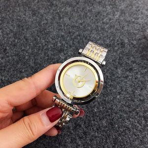 Moda Marka Zegarki Kobiety Panie Dziewczyna Kryształ Duże Litery Obracać Styl Wybieranie Metalowa Stalowa Taśma Kwarcowy Wrist Watch Designer Prezent Wysoce Quality Grace