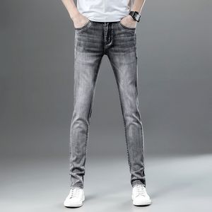 2022 nuovi jeans grigio fumo da uomo, versione coreana, elastico, sottile, da uomo, casual, pantaloni, popolare marchio di tendenza