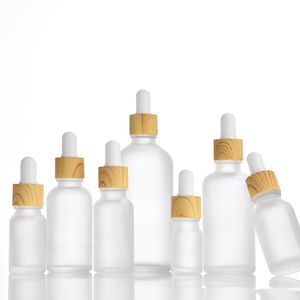 Oli essenziali in vetro smerigliato Bottiglie di profumo con tappo a venatura del legno Pipetta reagente Contagocce Contenitori per liquidi per aromaterapia 10 ml 30 ml 50 ml 100 ml