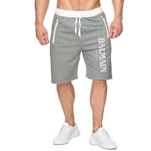 Designer shorts masculinos sobre o joelho respirável em execução shorts esportivos casuais shorts de natação absorventes de praia