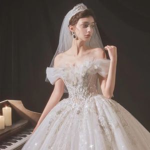 فستان زفاف فاخر جديد على الطراز الفرنسي للنساء 2022 قارب العنق مأدبة محكمة الأميرة كرات الثوب الأنيقة