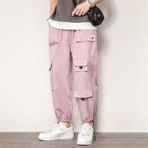 Calças de carga masculina de alta qualidade Hip Hop Calças casuais de várias bolsas de moda adolescente de carga solta masculina 201221