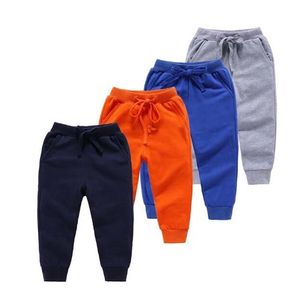 Primavera arrivo vestiti del bambino pantaloni lunghi per bambini moda tasche in cotone di colore puro sport ragazzo pantaloni leggings per bambini LJ201127