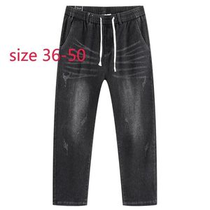 メンズジーンズ到着高品質ファッション秋の男性ファッショナブルなカジュアルな弾性ウエストデニムフルレングスプラスサイズ36-42 44 46 48 50men's