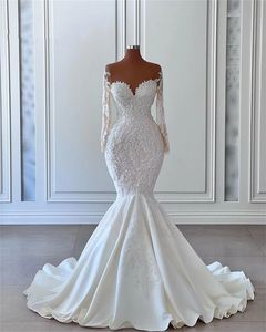 Abito da sposa a maniche lunghe Abito da sposa Appliques di pizzo di lusso Abiti da fidanzamento a sirena Abiti da sposa in raso con scollo a cuore robe de mariee