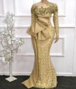 Sexig elegant afrikanska långa ärmar spetsar sjöjungfru prom klänningar guld se genom axel paljett med kristallpärlade aftonklänningar bär mantel de soiree med båge