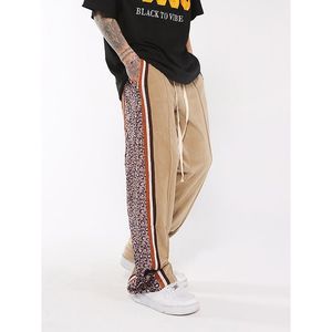 Calça masculina listrada listrada de veludo de leopardo para homens urban streetwear moda hop colorblock bloqueadores soltos veludo casual calçada mulher