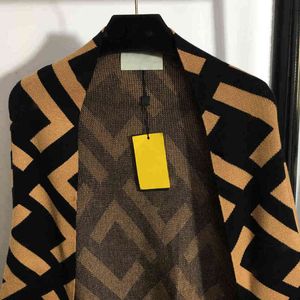 Wholesale wool wrap coat resale online - Fashion designer design fashion women designer wool knit cape shawl striped jacquard tassel midi coat cchen brand double F letter girls