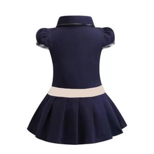 Neonate Vestono i bambini Risvolto College Wind Manica corta Polo plissettata Camicia a quadri a blocchi di colore Gonna media e piccola Abbigliamento casual per bambini