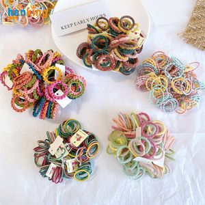 100 st/set gummi elastiska hårband flickor hårtillbehör färgglada nylon pannband barn hästsvans hållare scrunchie ornament gåva