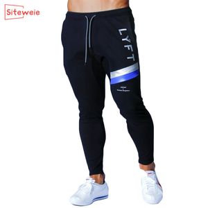 Siteweie Jogging calças homens usam calças de moletom de ginástica corredores de ginástica jogadores trilhas de algodão Slim Fit Calnts TRUSLESCEIRA GROUSED G248 201110