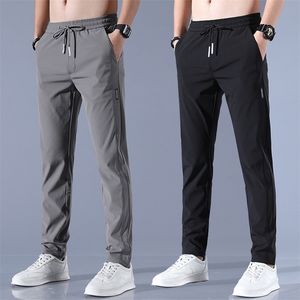 Męskie jedwabne spodnie Solid Kolor Midwaist luźne oddychające proste zwykłe cienkie spodnie sportowe 220810