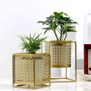 Nordic Light Luxury Gold Hollowed Flower Pot Creative Fashion Balcony Plant Stand Simple Atmosphere Indoor Decorative Shelf Q231018