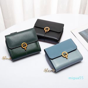 Väskor läder plånbok kvinnors korta vikbara mode mångsidiga tredelar en plånbok multikort position kohud plånböcker