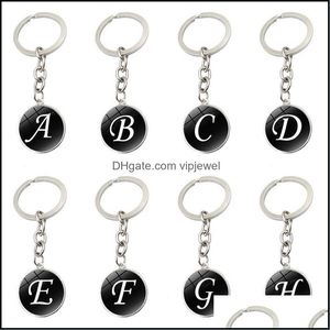 Nyckelringar Fashion Accessories Personifierade 26 Alfabet Keychain Jewelry Round Letter Charm Bag Key Ring Dhye8