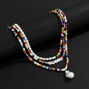 Pendanthalsband Rainbow Pärlor Chokerhalsband för kvinnor/män Boho skiktad pärla/brev pärlkedja på nacken 2022 mode juvelrypendant
