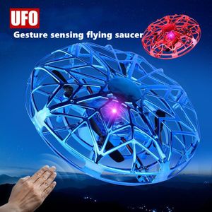 Wholesale ufo saucer for sale - Group buy Mini UFO Drone RC Helicopter Aircraft Toy Quadcopter Infrared Hand Sensing Interactive Flying Saucer Toys For Children