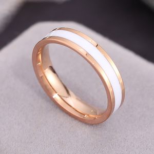 Ny mode svart vit emaljerad ring lyx ins stil ros guld pläterade rostfritt stål smycken