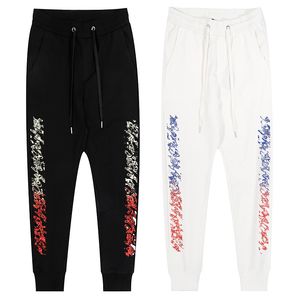 Calças masculinas alfabeto sânscrito outono feminino cruz sweatpants ferradura carta impressão calças tripulação casual calças esportivas