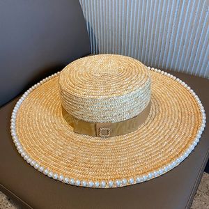 Elegant handgjord naturlig stråhatt för kvinnor bandage band slips pärla bred grim sun hatt derby skydd sommarstrand mössor