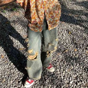 Streetwear design sense jeans strappati di nicchia per le donne 2022 estate nuovo y2k vintage dritto gamba larga jeans larghi a vita alta donne L220726