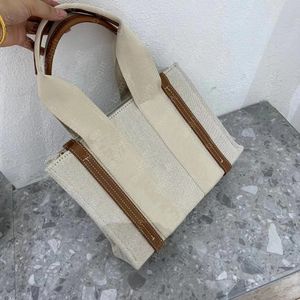 Designer Medium Woody Tygväskor Linne Canvas Shearling Denim Shopping Fick Luxury Designers Crossbody Shoulder Handbag Beach Bag