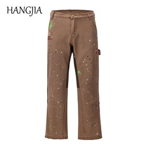 Pantaloni svasati cargo patchwork alla moda pantaloni kaki neri con inchiostro splash pantaloni larghi pantaloni hip-hop graffiti uomo 220325