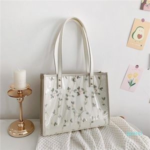 Kvällspåsar mode utsökta axlar retro casual kvinnor totes shopping väska kvinnlig spets designer vit handväska för blommor