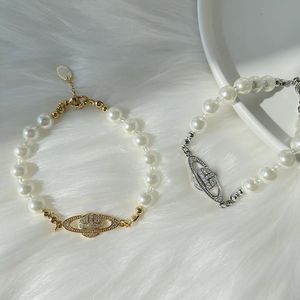 Rainha Ocidental Oeste com a mesma estrela de madeira Vivi Pearl Bracelets