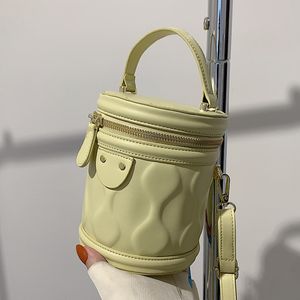 Bu yılın popüler küçük çanta kadın yaz TY1312 Yeni Modaya Niş Tasarım Tek Omuzlu Messenger Çantalar Doku Taşınabilir Kova Çantası