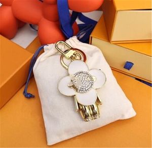 Högkvalitativ nyckelring Klassisk lyxdesigner Sunflower Key Chain Men Car Keyring Women Buckle Keychains Väskor Pendant Exquisite GI2294