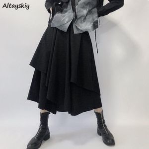 Jupes Femmes Harajuku Streetwear Cool Design Empire Asymétrique Mid-Calf Unisexe Girls Cound Japanese Style Couleur solide Elasticskirts