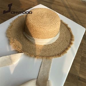 Cappello di paglia Cappello da donna a tesa larga con protezione solare Cappello da spiaggia Nastro bianco e nero Bowknot Cappello di paglia Cappello da donna casual Flat Top Panama 220519