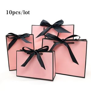 Pretty Pink Kraft Gift Bag Gold Present Box For Pyjamas klädböcker förpackning Guldhandtag Papperslåda Väskor Kraft Paper Gift Bag