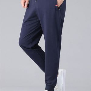 Wiosenne lato mężczyzn dresowe bawełniane joggery plus rozmiar 6xl 7xl 8xl Sportswear luźne spodnie na torze z kieszeniem na suwak 220621