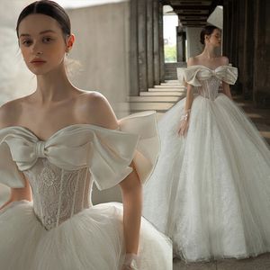 Princess Beige Bow A Line Wedding Suknia kochanie z ramion długiej koronki i tiulowe suknie ślubne luksusowe perły koralikowe gorsetowe sukienki panny młodej szat de mariee