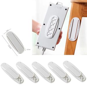 Wall-Mounted Holder Punch-free Plug Fixer Self-Adhesive Socket Fixers Seamless Power Strip Holder Home Cable Wire Organizer Racks