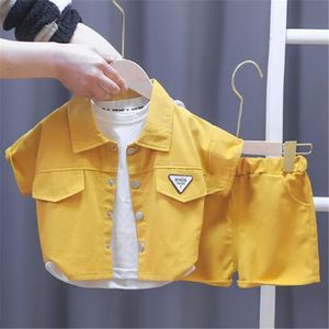 Designer de moda infantil conjuntos de roupas meninos meninas manga curta lapela camisas shorts simples casual duas peças terno verão crianças roupas do bebê