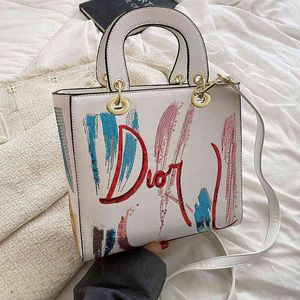 Emmer tassen voor vrouwen Nieuw luxe designer merk boetiek modebrief afdrukken van een schoudertassen dames gesplitste lederen tas y220720