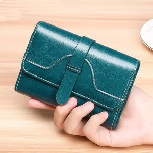 RFID Protected Genuine Cow Leather Women Designer Wormeds Lady Fashion Casual Zero Card Pulses No55