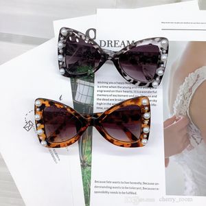 Kinder-Schmetterlings-Stil-Perlen-Sonnenbrille, Ins-Kinder-Bowknot-Einsatz, Perlen, Mode, schöne adumbrale Brille, Gezeiten-Jungen-Mädchen-Strand-Brille B337