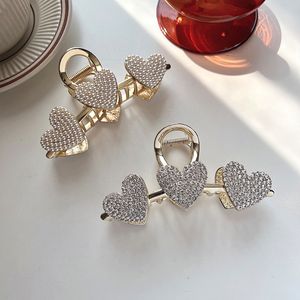 ラブクランプパールダイヤモンドクロークリップ女性韓国蝶のヘアクリップメッキゴールドかわいい人気の宝石飾り5948 Q2
