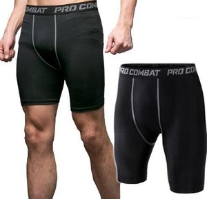 Moda Masculino Bodyboulding Shorts Compressão Dryfit Running Fitness Masculino Suor Elástico Ginásio Calças curtas